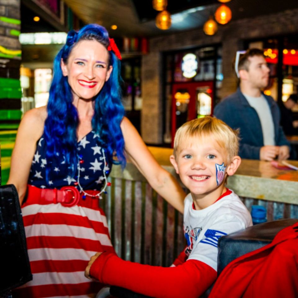 Mother and son celebrating fourth of july in festive attire